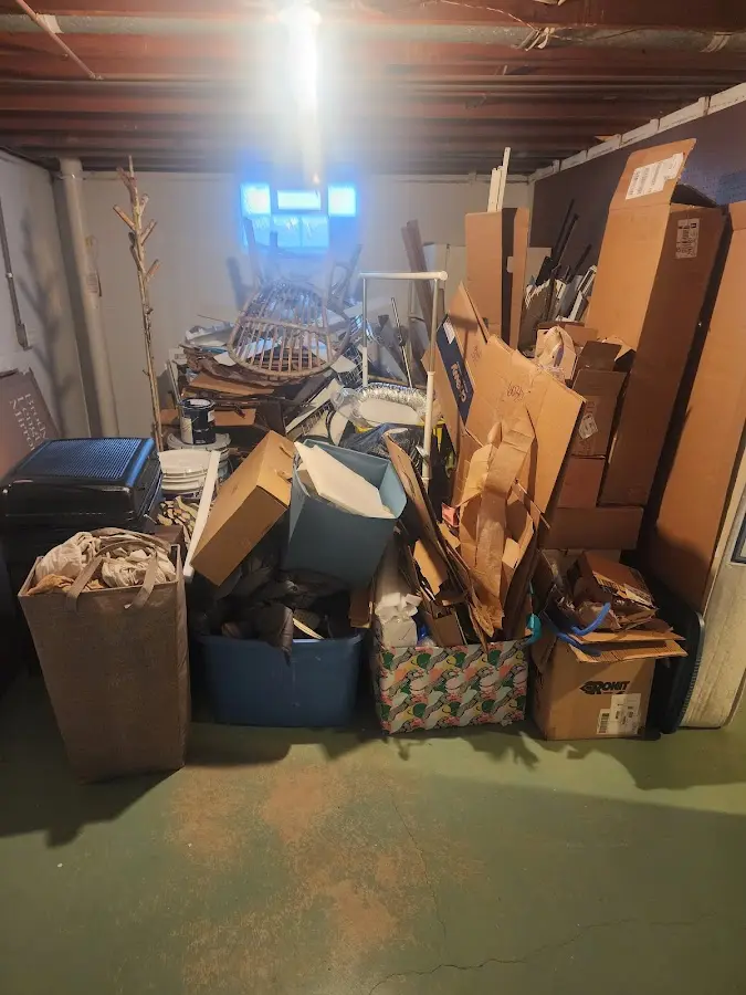 Roll-off dumpster container at job site for 6 Yard Dumpster Rental in Hugo